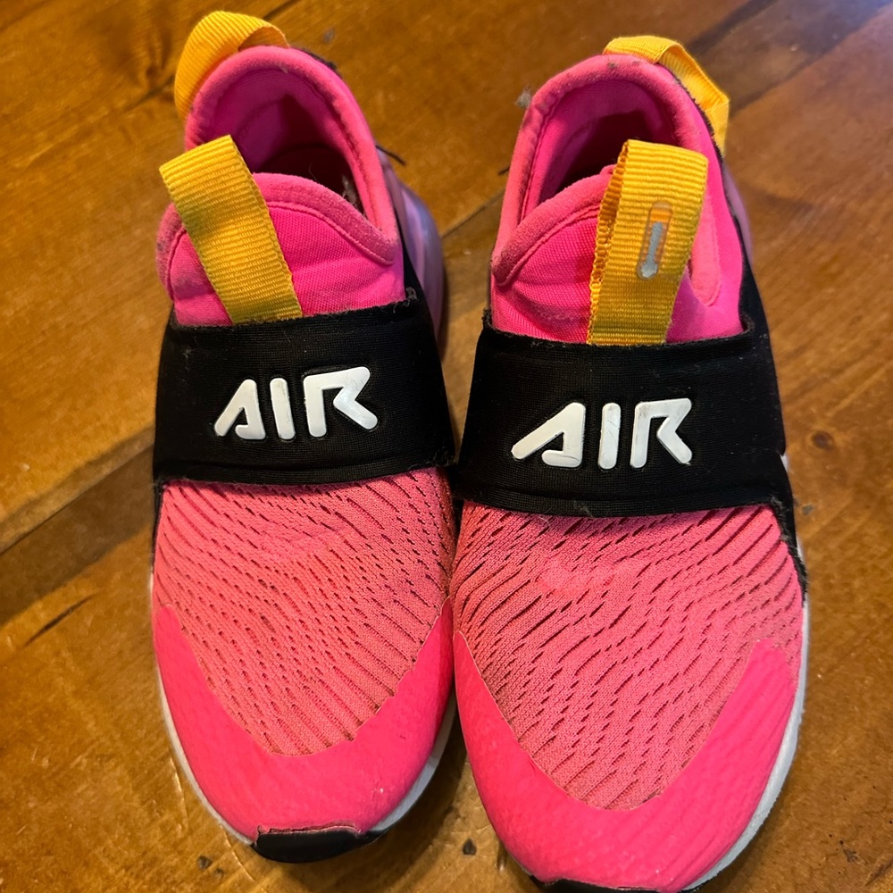 Nike Pink and Black Sneakers with Wavy Knit Design